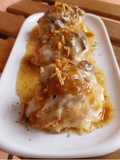 Patatas a la importancia con carrilleras y queso fundido
