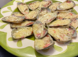 Una foto de Machas a la parmesano