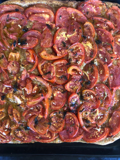 Una foto de Coca de tomate
