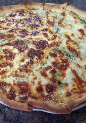 Una foto de Tarta de verduras espinaca, cebollas y ajíes