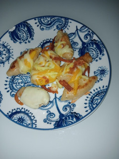 Una foto de "Bolitas" de queso y lacón