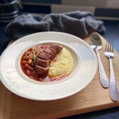 A picture of Italian Fennel Sausage & Cannellini Bean Stew (Salsiccia e Fagioli).