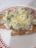Trucha con crema de champiñones