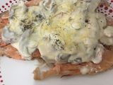 Trucha con crema de champiñones