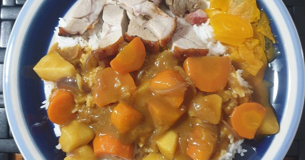 Japanese curry rice with roast pork and pickle radish on rice Recipe by