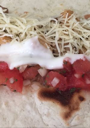 Una foto de Fajitas de carne con pico de gallo 🌮