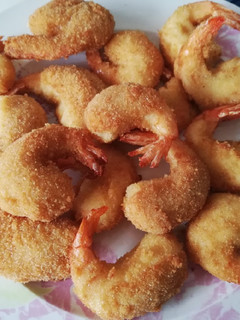 Una foto de Langostinos con bechamel 🍤🦐🍤