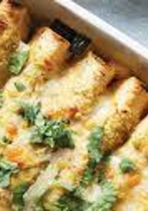 A picture of Vegetable chicken enchiladas.