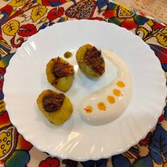 A picture of Chutney filled potato bites.