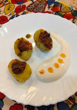 A picture of Chutney filled potato bites.