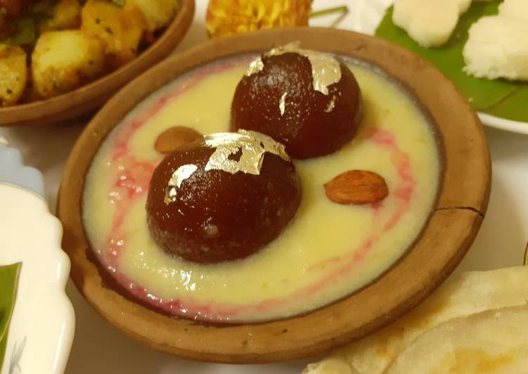 Step-by-Step Guide to Prepare Quick Gulabjamun in pineapple and rose rabri