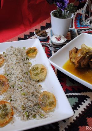 A picture of Persian dill and fava beans rice with lamb shank (baghali polow BA mahichey).
