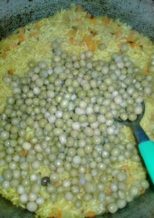 Una foto de Arroz frito con arvejas