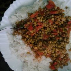 A picture of Rice and greengrams stew.