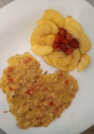 A picture of Oat veggies omelet with dessert.