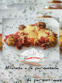 Una foto de Milanesa de pollo a la parmesana