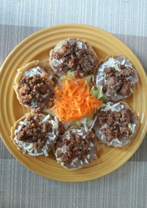 A picture of Sopes with Beans and Meat.