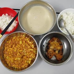 A picture of Fish & Baked beans with tomato sauce with eggs and potatoes.