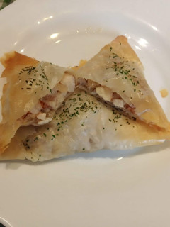 Una foto de Briwat de pollo y cebolla caramelizada Exprés