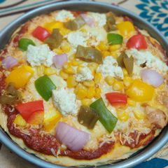 Cheese and veggies pizza A picture of Cheese and veggies pizza.