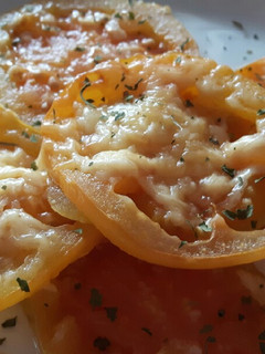Una foto de Tomates gratinados
