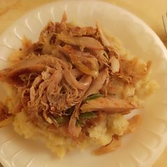 A picture of Chicken fajitas with mashed potatoes.