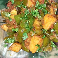 Capsicum Potato dry sabzi A picture of Capsicum Potato dry sabzi.