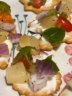 A picture of Pineapple salsa canapes.