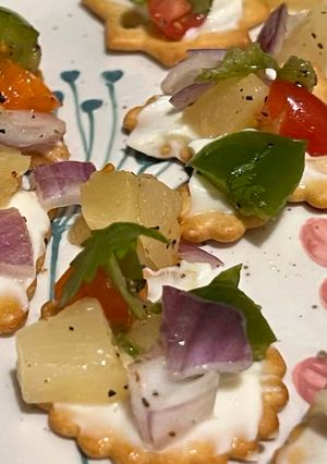 A picture of Pineapple salsa canapes.