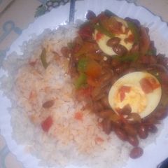 A picture of Rice beans and eggs stew.