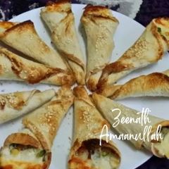 A picture of Baked Bread Pizza Cones.