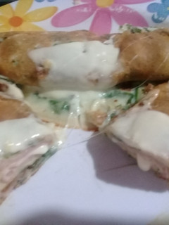 Una foto de Canelones de acelga con paleta y queso