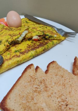 સ્ટફડ ઓમલેટ(Stuffed Omlette Recipe In Gujarati) રેસીપી મુખ્ય ફોટો