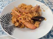 Una foto de cigalas con tomate
