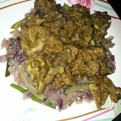 A picture of Sauteed beef with caramalised onion.