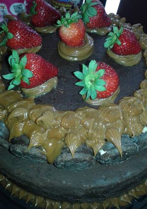 Una foto de Torta de Vainilla bañada en chocolate