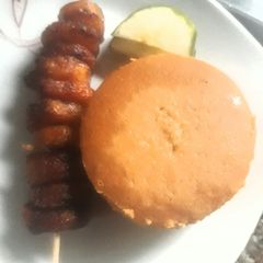 A picture of Moimoi with fried plantain.