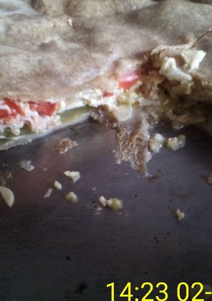Una foto de Torta de zapallitos y morrón liviana