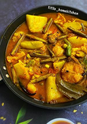 A picture of Fish Curry with Vegetables.