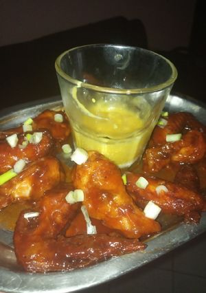 A picture of Spicy (mild) chicken wings.