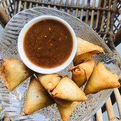 A picture of One bite samosa.