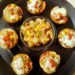 A picture of Pasta pizza cups.