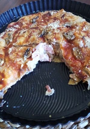 Una foto de Empanada de obleas con cobertura de pizza