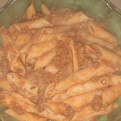 A picture of Tomato sauce and minced meat pasta.