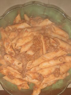 A picture of Tomato sauce and minced meat pasta.