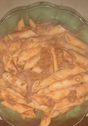 A picture of Tomato sauce and minced meat pasta.