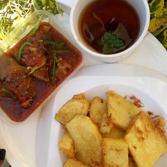 A picture of Yam delight and cowleg pepper soup.