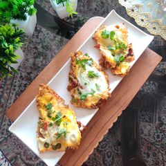 A picture of KHAGINA (a savoury egg dish).