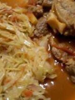 A picture of Meat stew with cabbage.