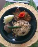 Lengua en salsa acompañada de arroz con coco